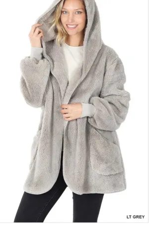 Hooded faux fur jacket with pockets